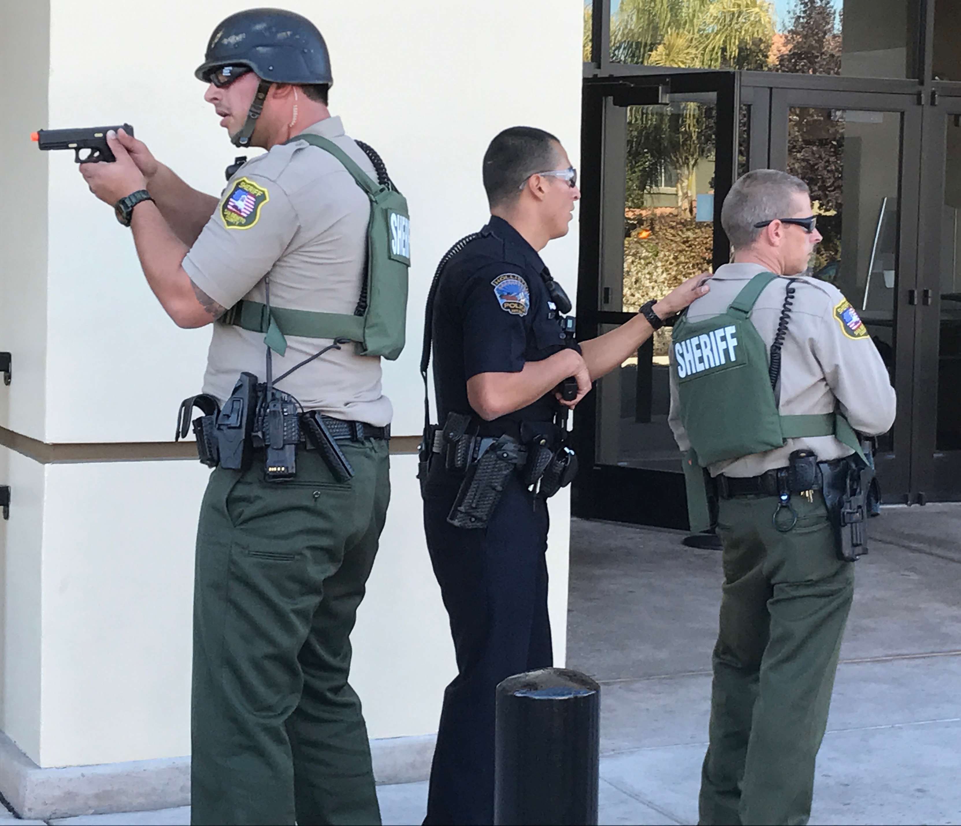Hollister police and San Benito County sheriff's deputies outside Premiere Cinemas during the active shooter drill Nov. 17.